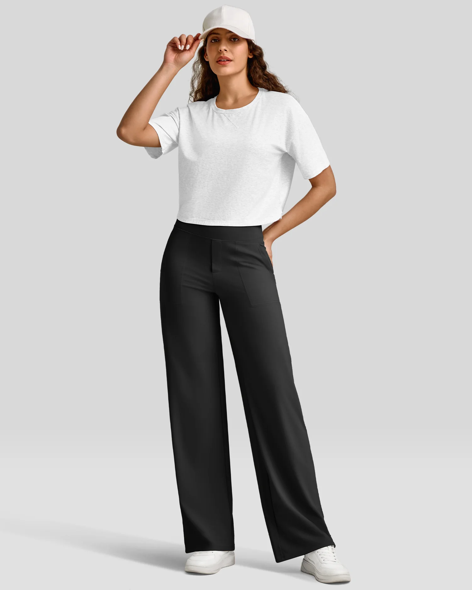 G4Free EverGoing pants styled with crop tee and cap — office to street
